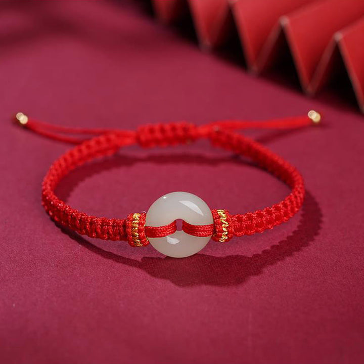 Bracelet tressé en jade avec boucle de paix et Buddha Stones