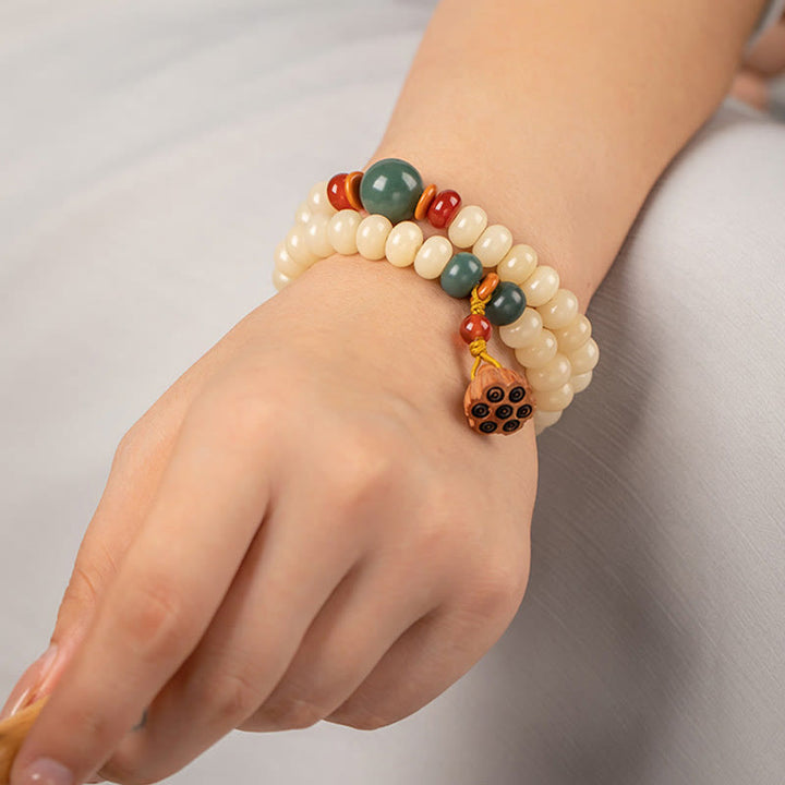 Bracelet double tour avec breloque en forme de gousse de lotus et graines de Bodhi et Buddha Stones