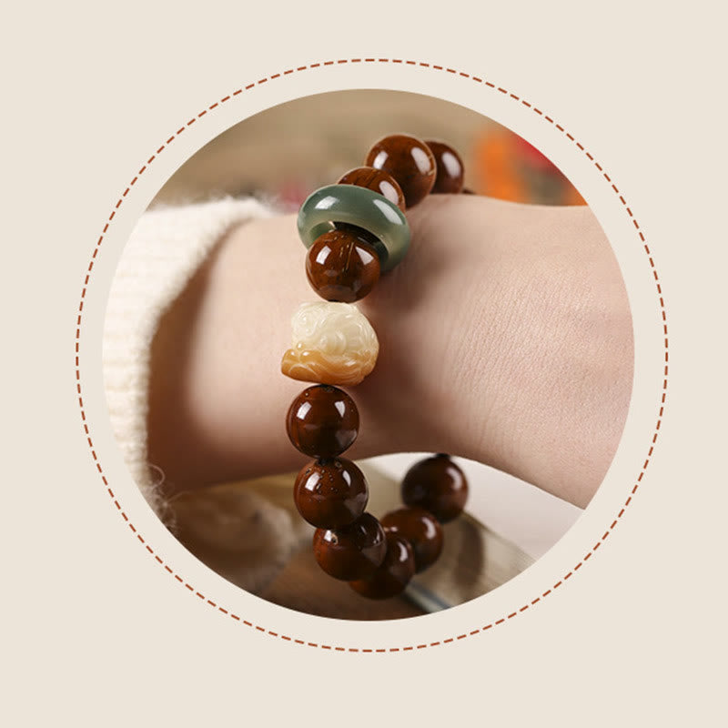 Bracelet de sagesse du lion dansant en Buddha Stones et graines de Bodhi violettes