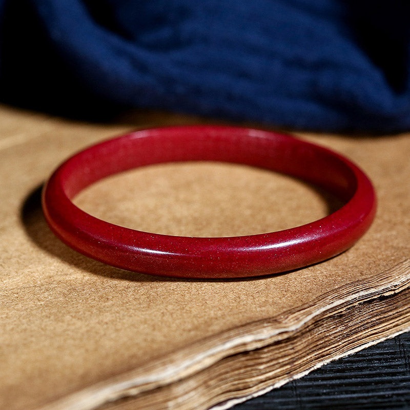 Bracelet jonc de bénédiction gravé du Sutra du cœur en Buddha Stones en cinabre