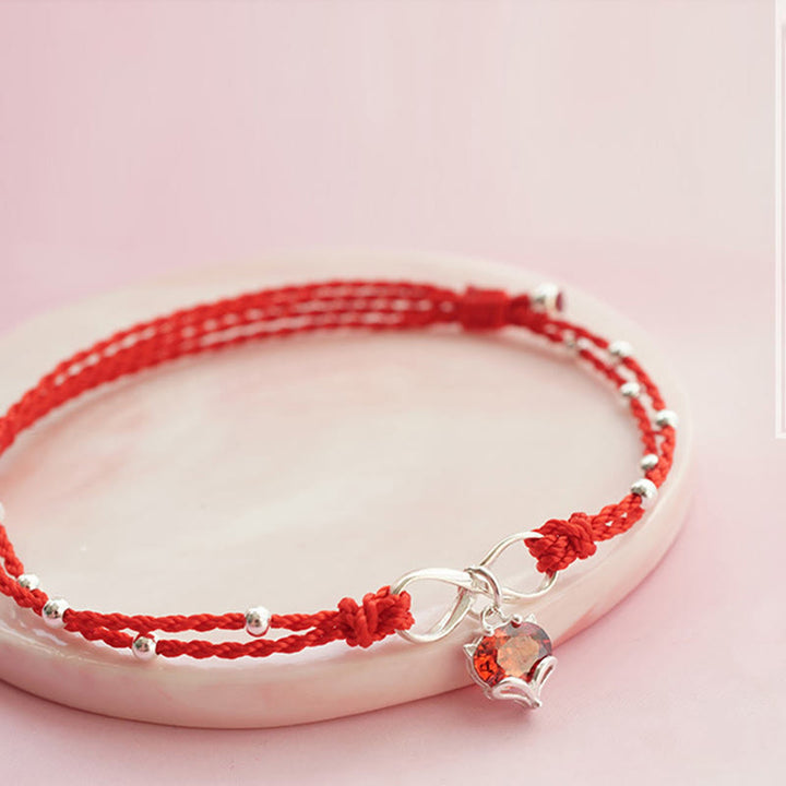 Bracelet de cheville tressé avec symbole de l'infini et du cœur en Buddha Stones