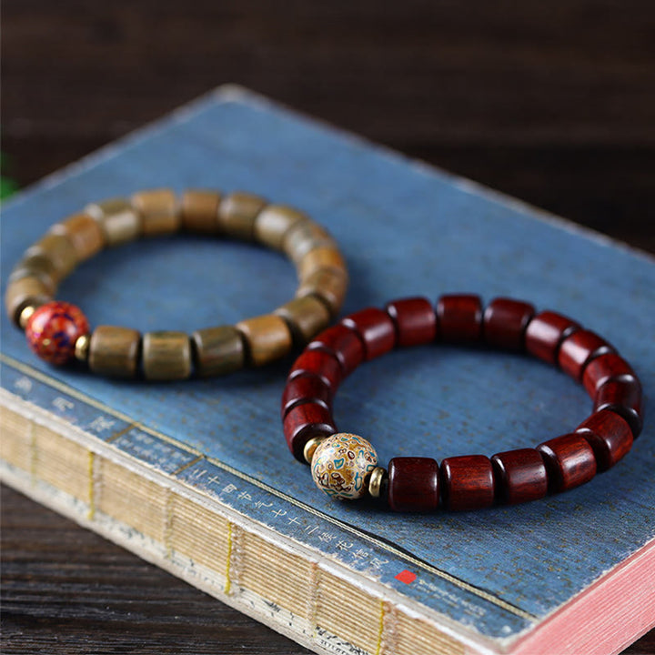 Bracelet de paix en Buddha Stones de bois de santal vert naturel et petites feuilles de bois de santal rouge laqué