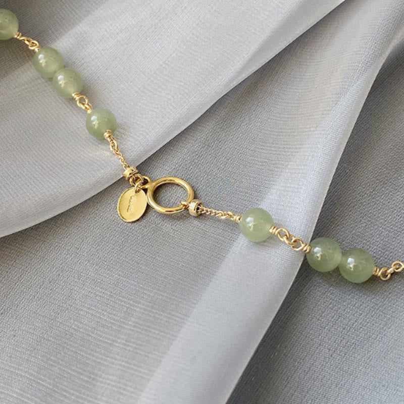 Bracelet chaîne de prospérité en perles de jade Hetian plaqué or 14 carats