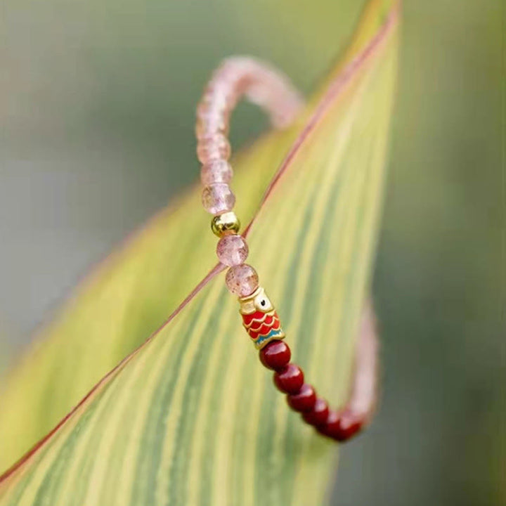 Bracelet de guérison porte-bonheur en quartz fraise et cinabre en Buddha Stones