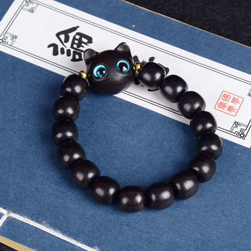 Bracelet d'équilibre en forme de chat avec Buddha Stones en bois d'ébène, bois de santal vert et bois de santal rouge - Perles Chat en ébène 12 mm x 15 (tour de poignet 14-16 cm) - image 1