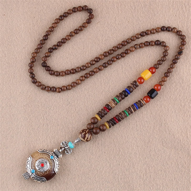 Collier pendentif protection éléphant en Buddha Stones tibétain en bois de wengé Bodhi Seed Agate