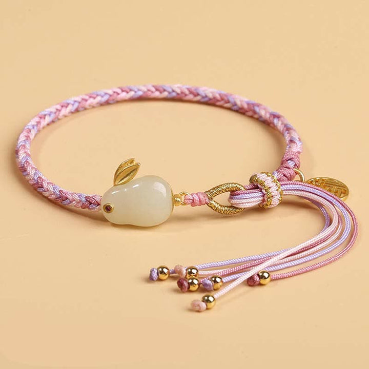 Bracelet tressé de protection avec cordon porte-bonheur et nœud de réincarnation
