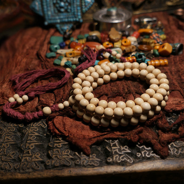 Mala en bois d'Abelia Biflora avec 108 Buddha Stones pour éloigner les mauvais esprits