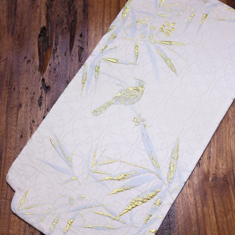 Dessous de verre élégant à motif de brocart floral pour tasse à thé