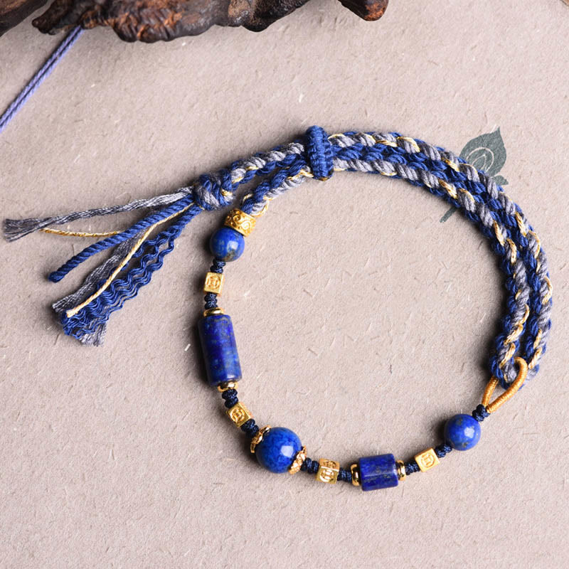 Bracelet en corde positive en perles de lazurite naturelles faites à la main avec des Buddha Stones