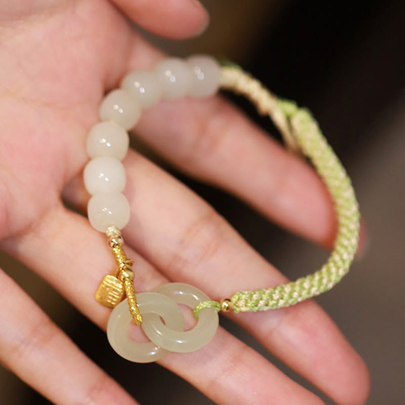 Bracelet tressé en perles de jade Hetian naturelles de Buddha Stones avec boucle de paix double et caractère Fu