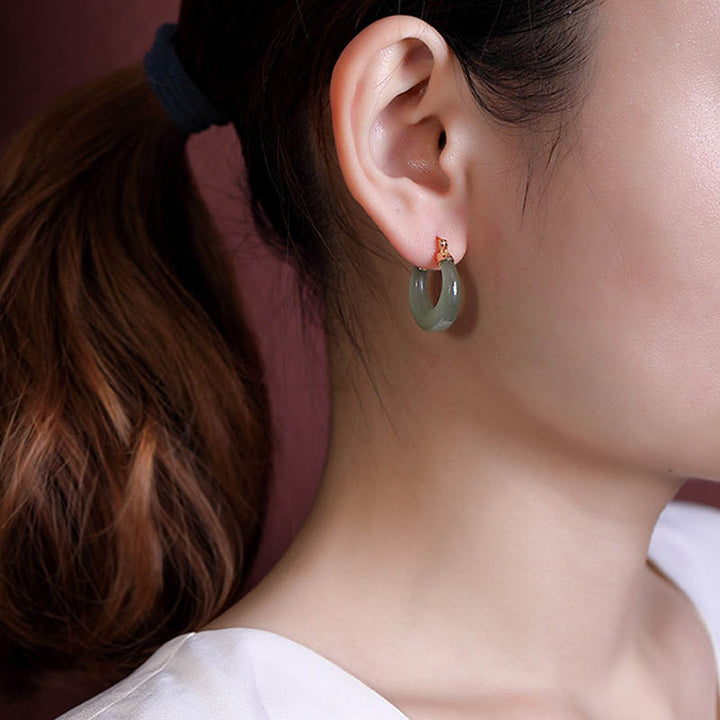Boucles d'oreilles pendantes en jade cyan avec Buddha Stones rondes pour la prospérité et la chance