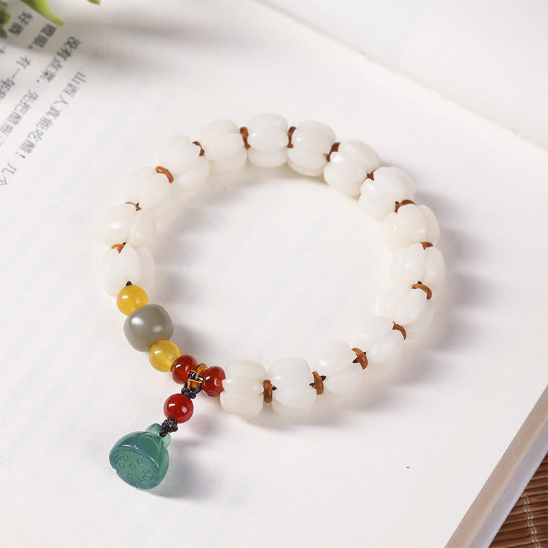 Bracelet en perles de citrouille gravées en agate rouge Bodhi Calme Harmonie Bodhi Graines naturelles Lotus