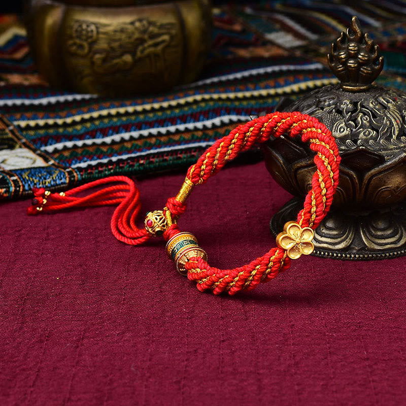 Bracelet en corde tissée avec breloque en forme de fleur et roue de prière en Buddha Stones faites à la main avec cinq dieux de la richesse et de la chance