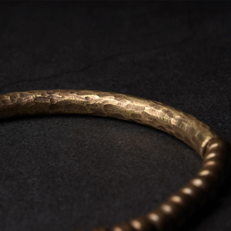 Bracelet porte-bonheur en perles de cuivre et de laiton au design simple Buddha Stones