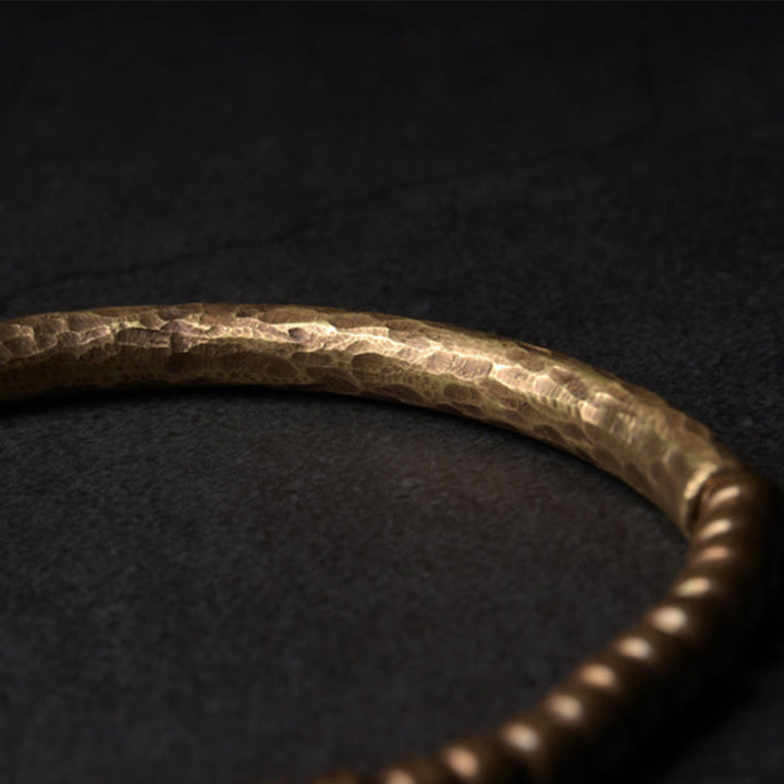 Bracelet porte-bonheur en perles de cuivre et de laiton au design simple Buddha Stones
