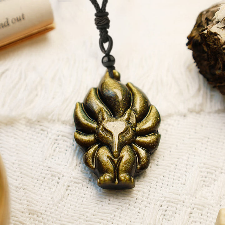 Collier de protection avec pendentif en Buddha Stones dorés