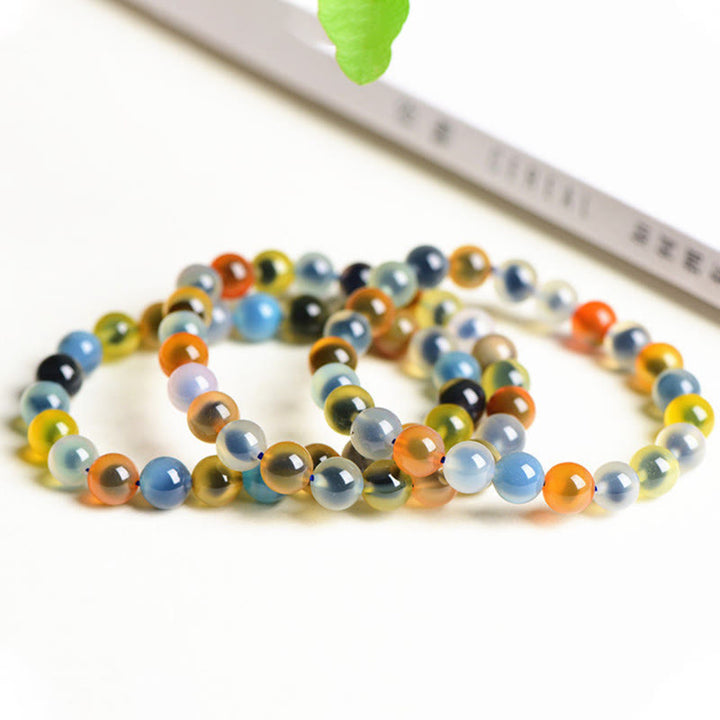 Bracelet de perles en agate naturelle colorée de Buddha Stones Harmony Strength