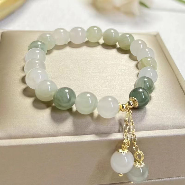 Bracelet porte-bonheur en perles de jade à dégradé naturel et Buddha Stones