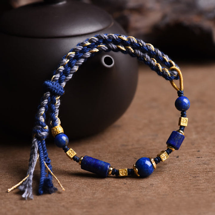 Bracelet en corde positive en perles de lazurite naturelles faites à la main avec des Buddha Stones