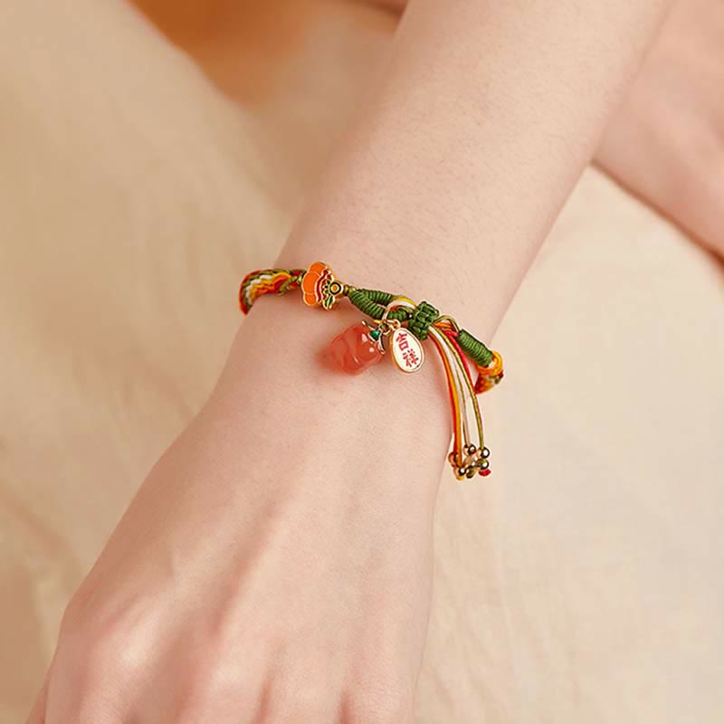 Bracelet tressé en corde avec nœud de force et de réincarnation en agate rouge et Buddha Stones