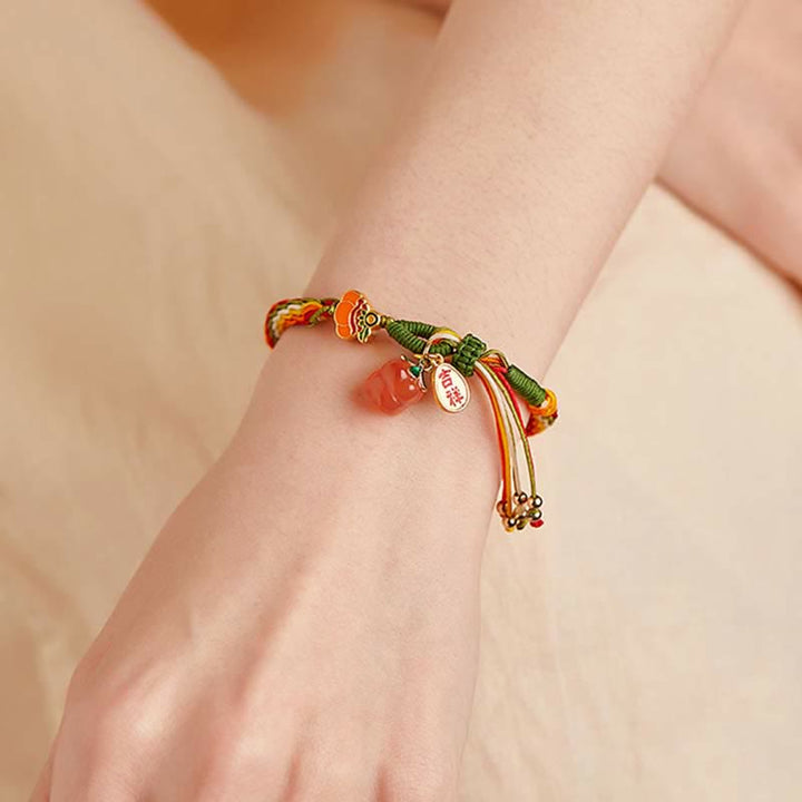 Bracelet tressé en corde avec nœud de force et de réincarnation en agate rouge et Buddha Stones