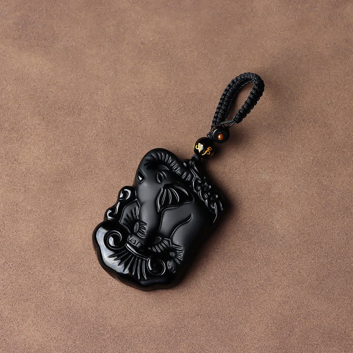 Collier avec pendentif en obsidienne noire et protection d'éléphant