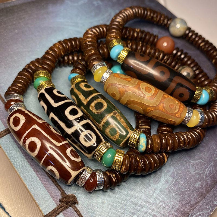 Bracelet de richesse en perles tibétaines à neuf yeux Dzi Buddha Stones