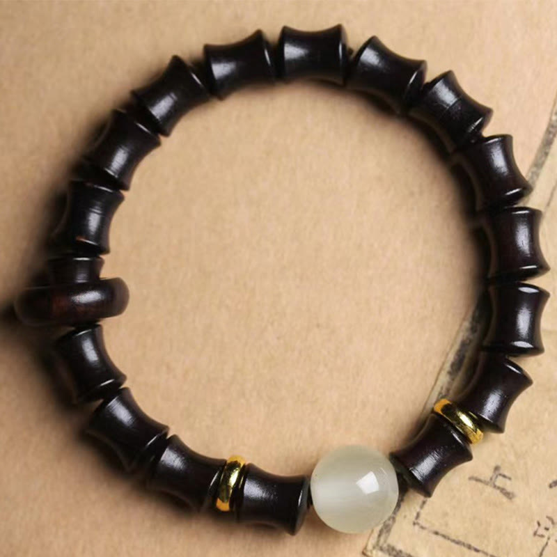 Bracelet de paix en bambou et bois de santal vert et ébène avec Buddha Stones