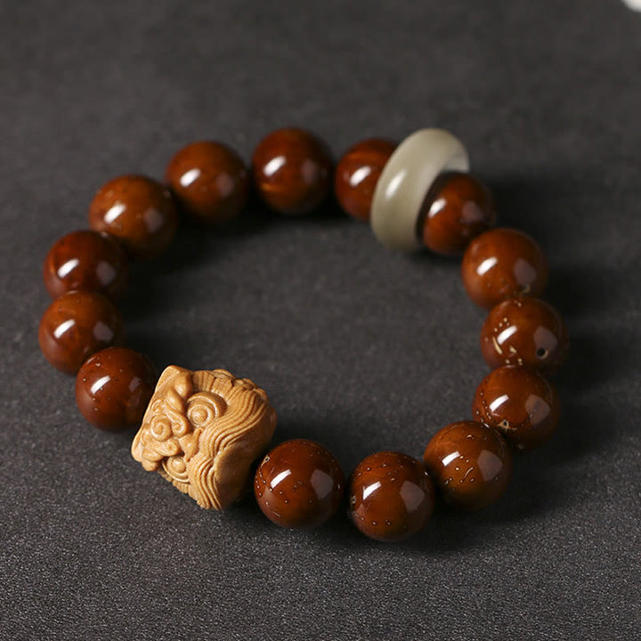 Bracelet de sagesse du lion dansant en Buddha Stones et graines de Bodhi violettes