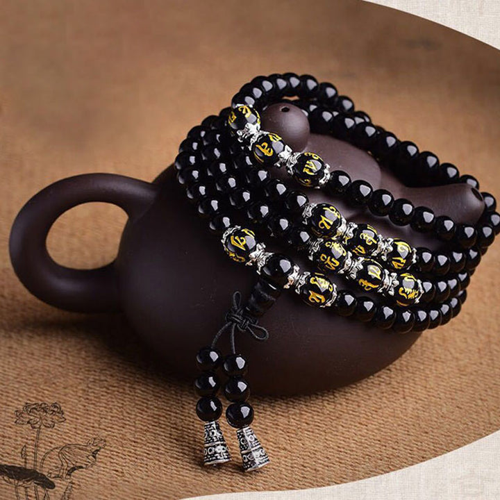 Bracelet Mala de protection en obsidienne noire avec six mots vrais de Buddha Stones