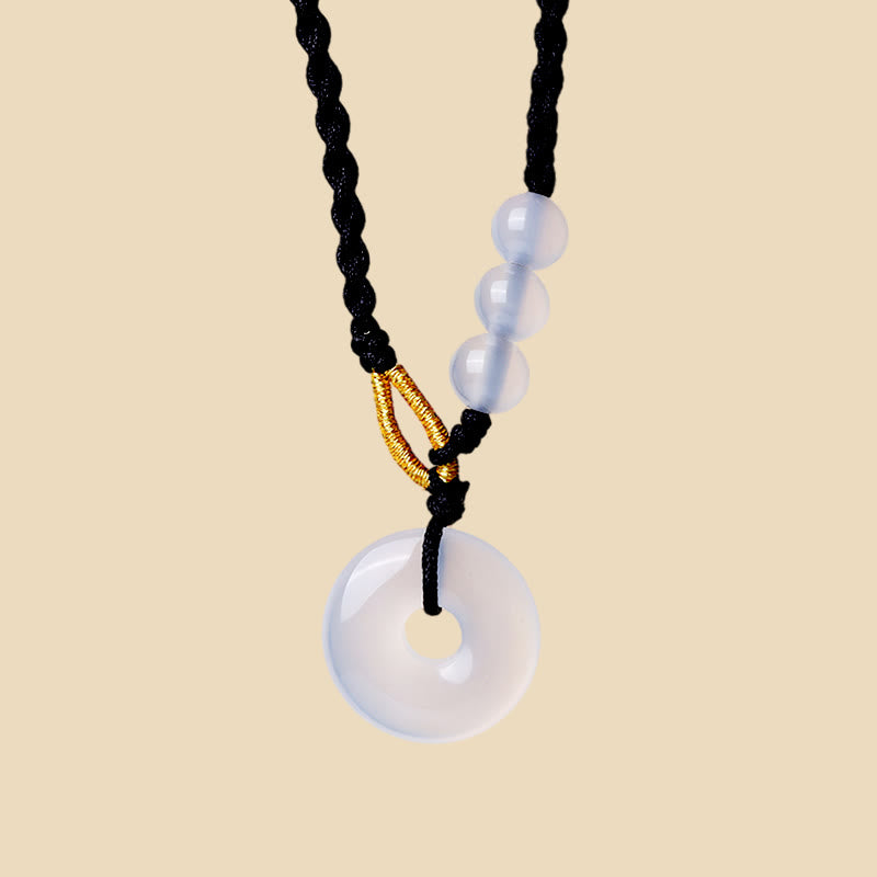 Collier pendentif de guérison avec boucle de paix en quartz fraise et calcédoine de Buddha Stones