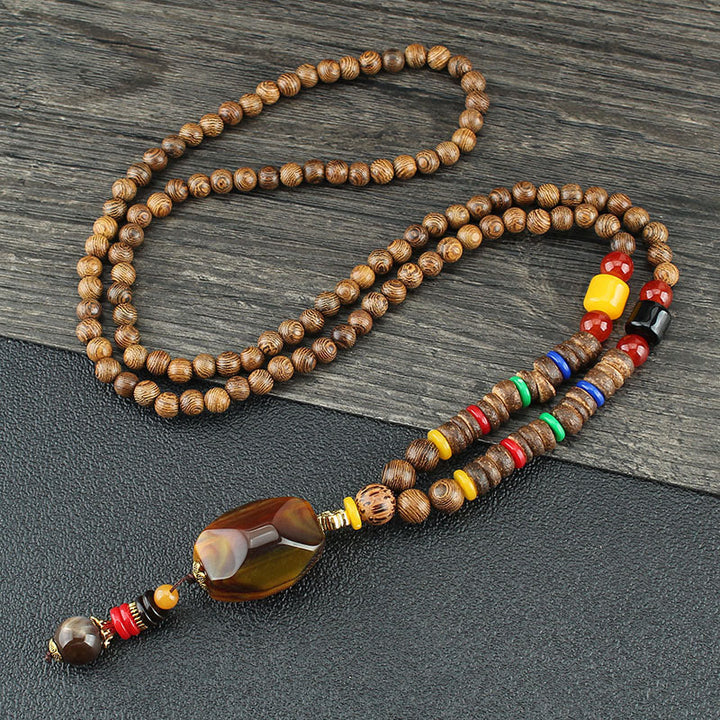 Collier pendentif en Buddha Stones tibétain en bois de wengé Bodhi Seed Agate Balance Peace