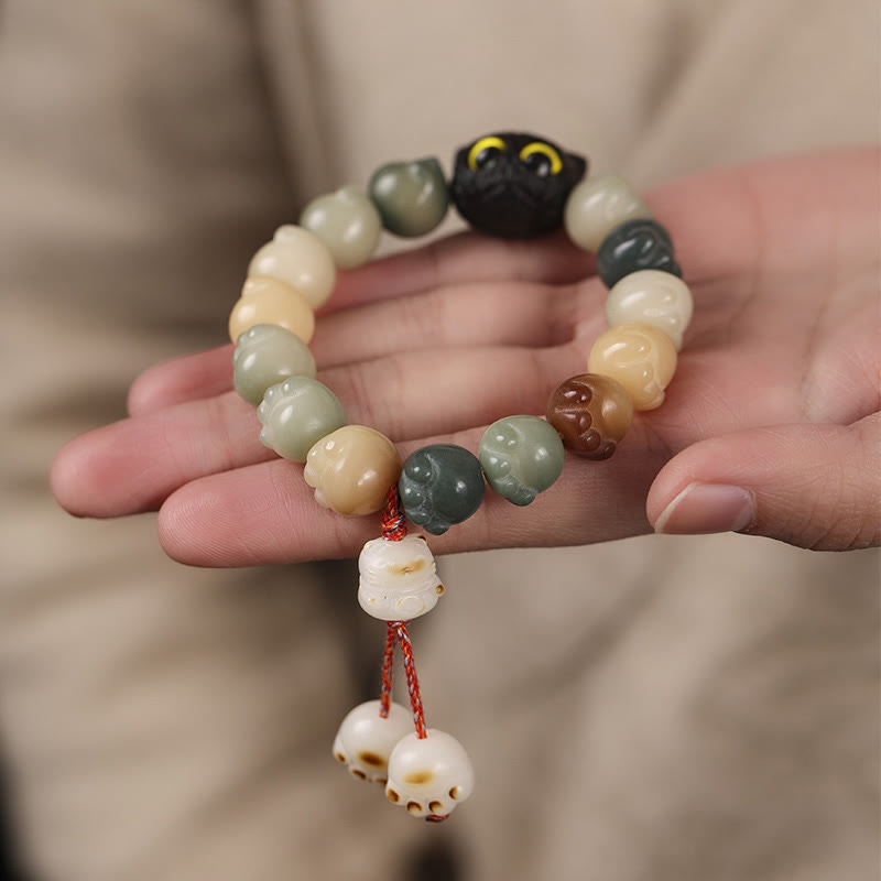 Bracelet de sagesse porte-bonheur en bois d'ébène avec de belles pattes et des graines de Bodhi naturelles de Buddha Stones - image 11