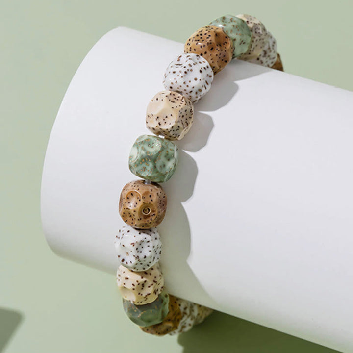 Bracelet de richesse et de bon augure en Buddha Stones naturelles et colorées