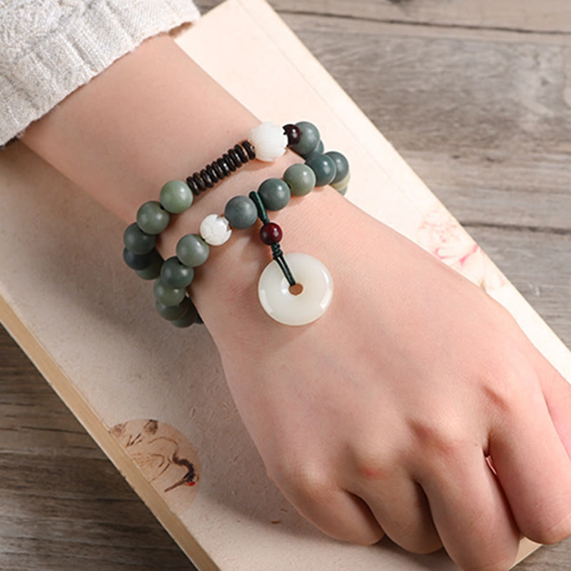 Bracelet double tour en jade et pierre de Buddha Stones avec boucle de paix et sagesse