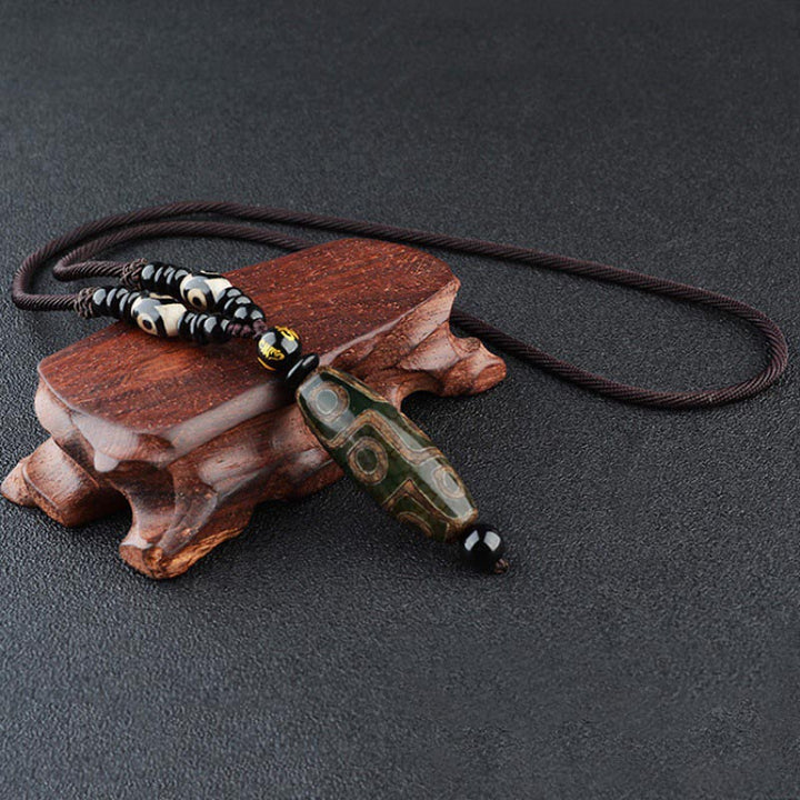 Collier de protection de richesse en perles Dzi à neuf yeux de Buddha Stones