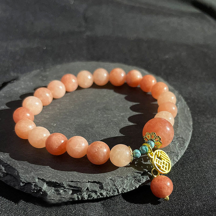 Bracelet porte-bonheur en Buddha Stones orange naturelle turquoise avec personnage Fu
