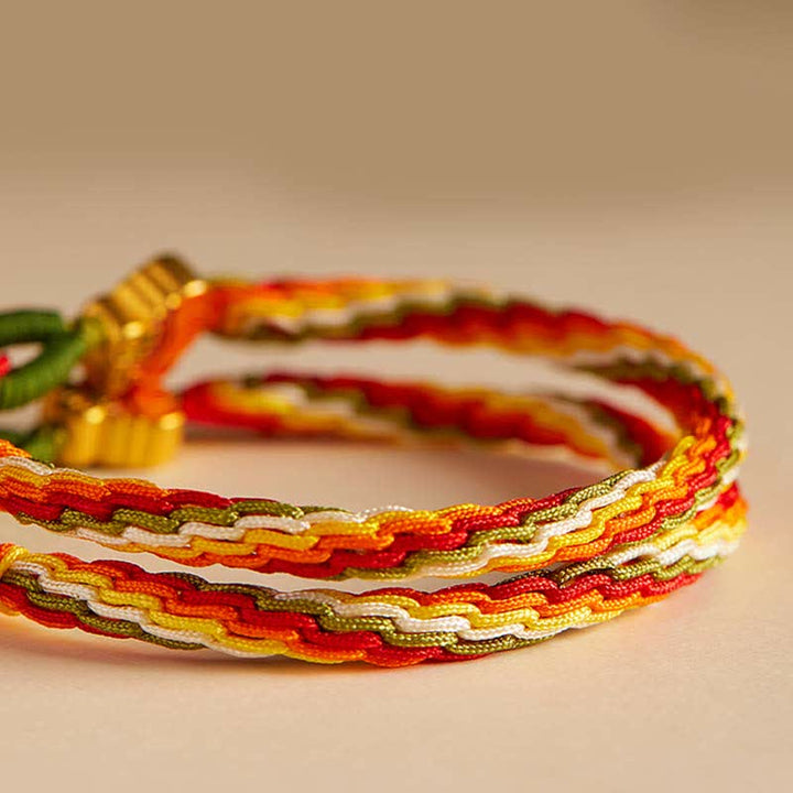 Bracelet tressé en corde avec nœud de force et de réincarnation en agate rouge et Buddha Stones