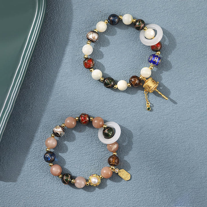 Buddha Stones Encens tibétain Cendres Verre Liuli Pierre Tridacna Pierre de Soleil Om Mani Padme Hum Bracelet à breloques pour roue de prière