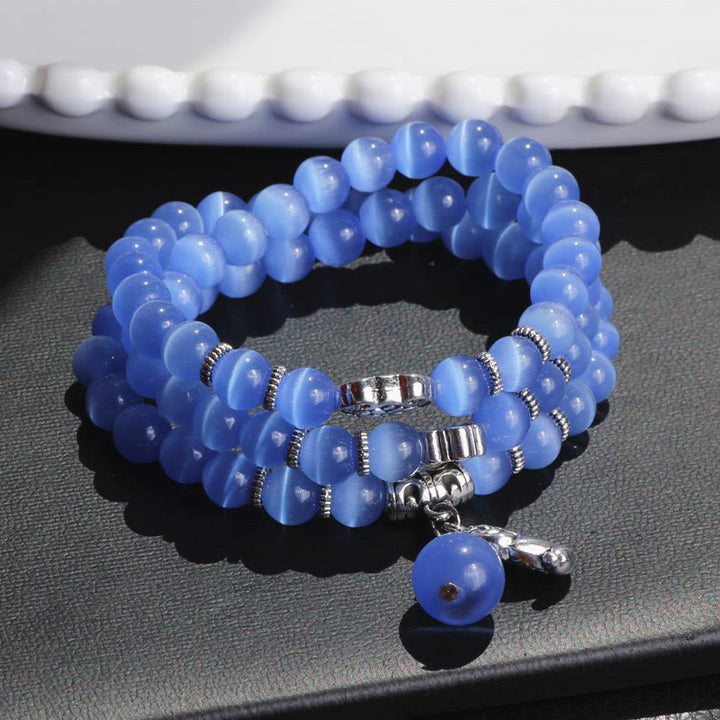 Bracelet triple tour de soutien PiXiu œil de chat en Buddha Stones