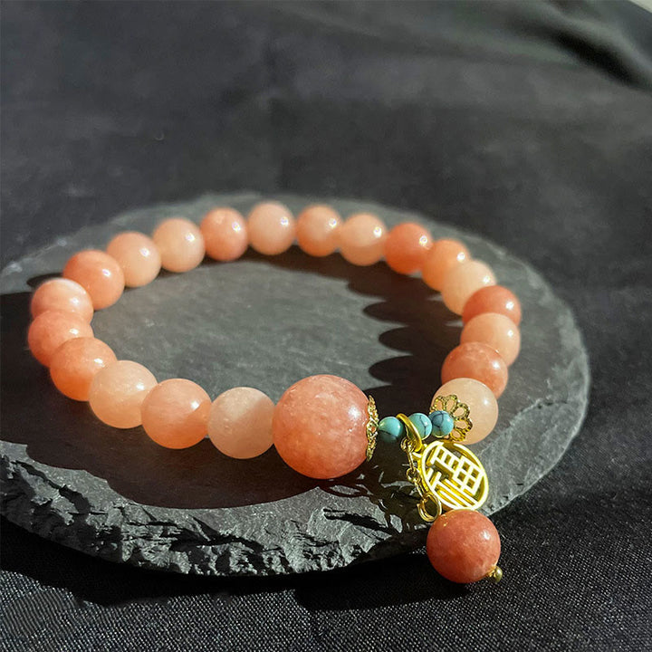 Bracelet porte-bonheur en Buddha Stones orange naturelle turquoise avec personnage Fu