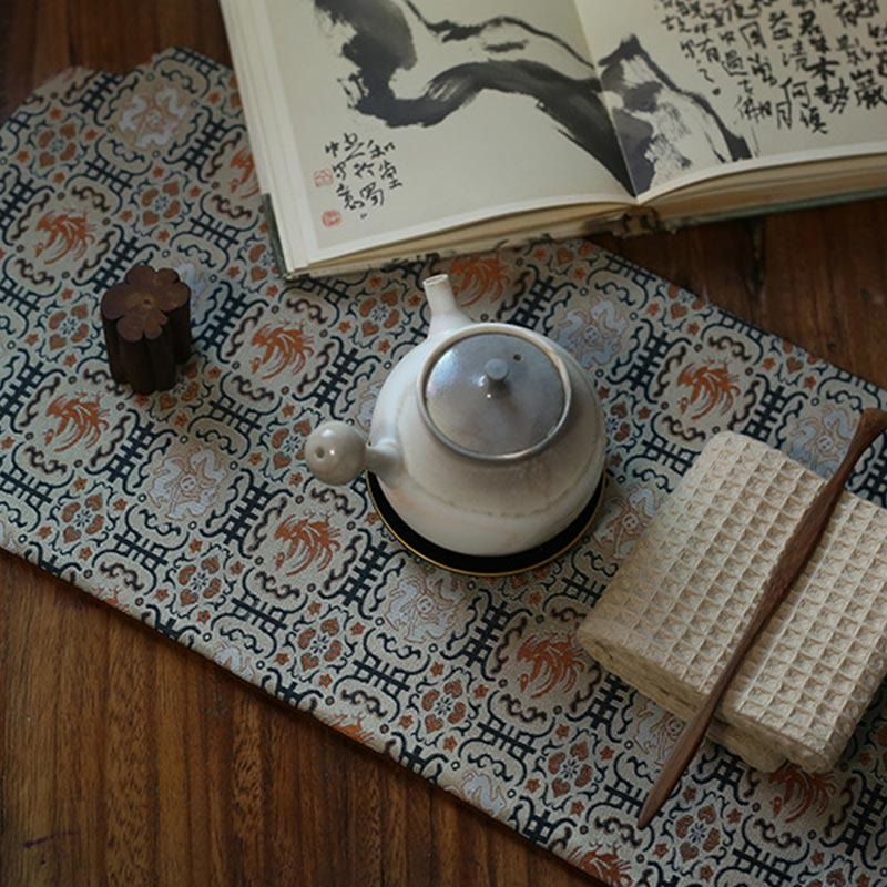 Dessous de verre élégant à motif de brocart floral pour tasse à thé