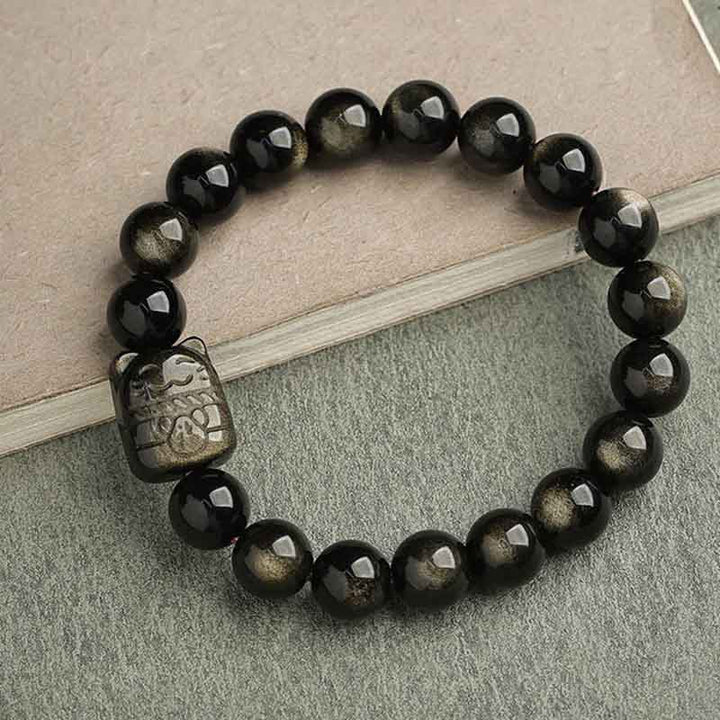 Bracelet de protection porte-bonheur en obsidienne dorée et argentée avec Buddha Stones et jolie patte de chat porte-bonheur - Obsidienne à reflets dorés - Chat porte-bonheur - 10 mm - image 20