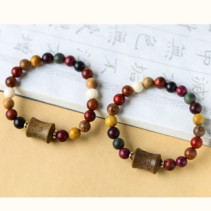Bracelet de protection Om Mani Padme Hum en bois de santal multicolore du Tibet