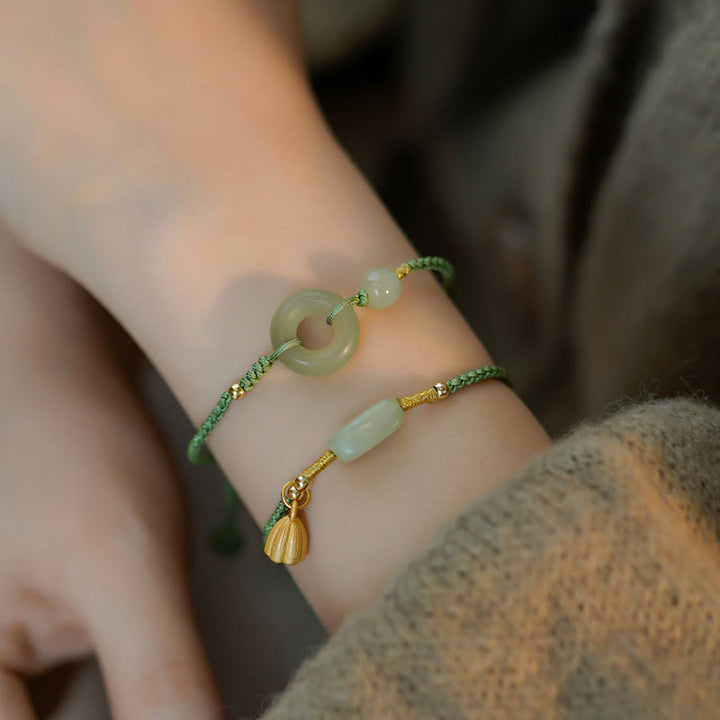 Bracelet en corde avec perles porte-bonheur et breloque en jade et Buddha Stones