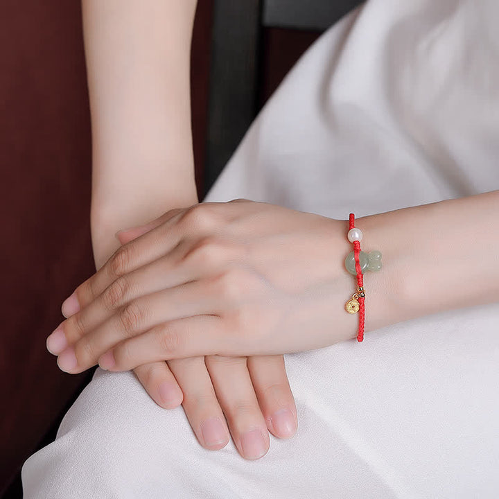 Bracelet en argent sterling 925 avec cordon rouge et pièce de cuivre en jade Hetian Année du lapin