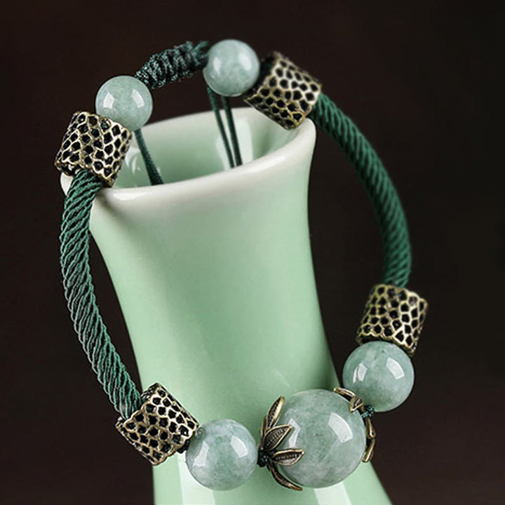 Bracelet de prospérité en perles de jade et corde verte fait main avec Buddha Stones