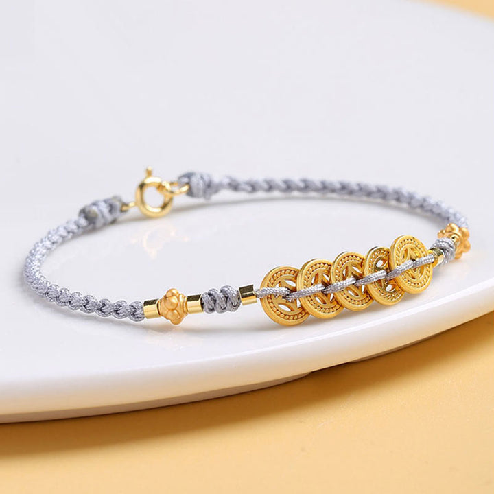 Bracelet tressé en corde bleue avec perles et arbre de fortune en cuivre et Buddha Stones