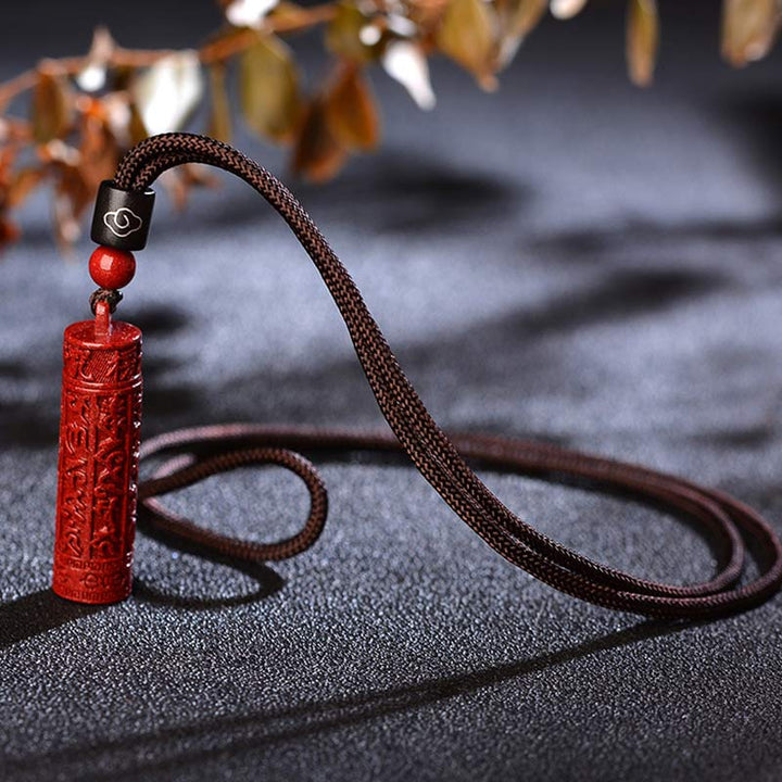 Collier de concentration de mantra tibétain en Buddha Stones en cinabre
